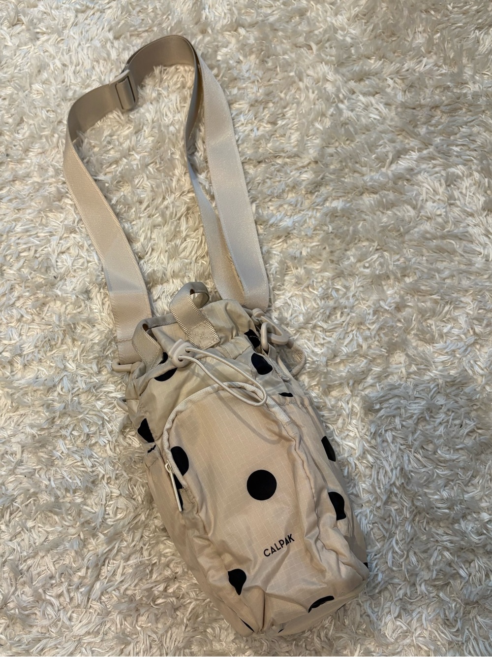 Calpak Cream Crossbody Bag with Black Polka Dots